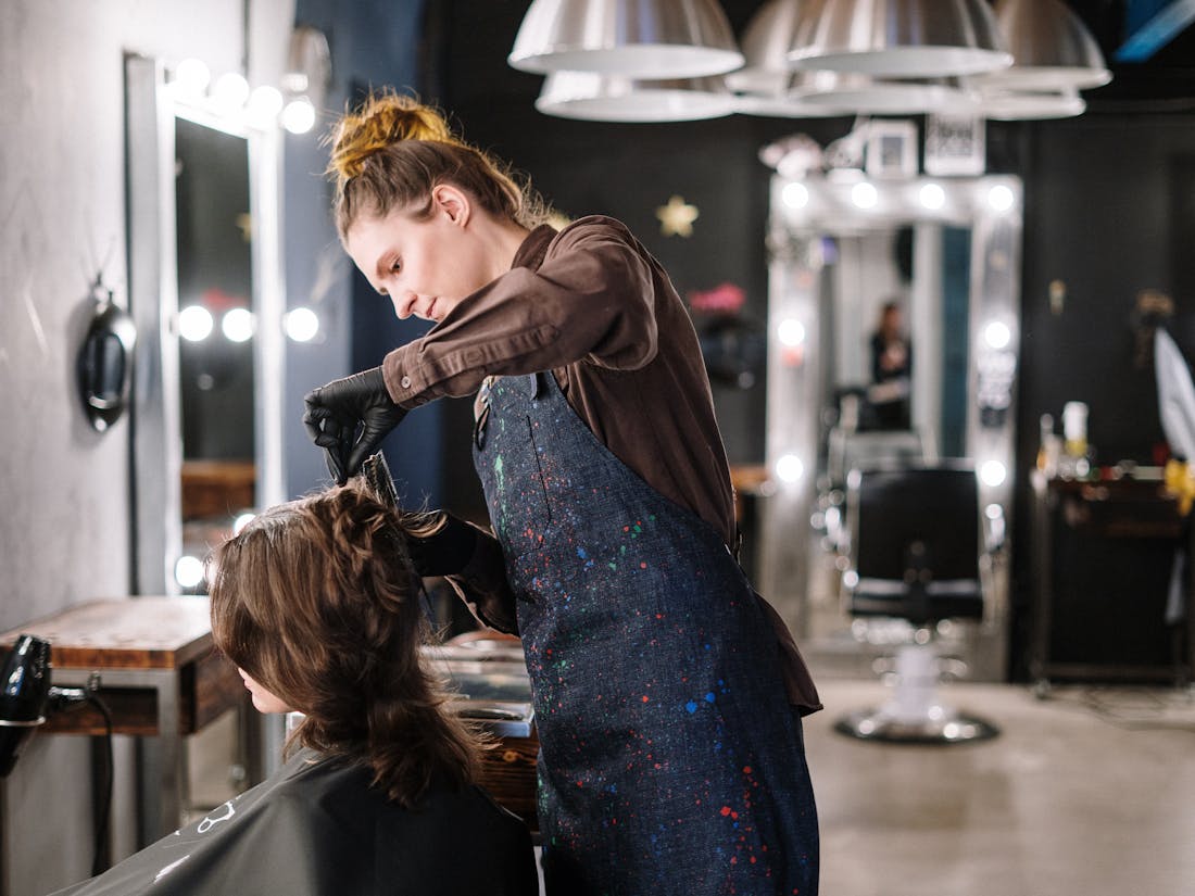 A stylist in a modern salon